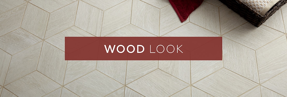 Light ash wood look tile flooring in a 3D cube mosaic